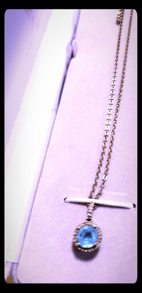 Real Diamond necklace with blue stone. 💙